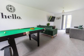 Spacious 4-bedroom home near city centre with parking